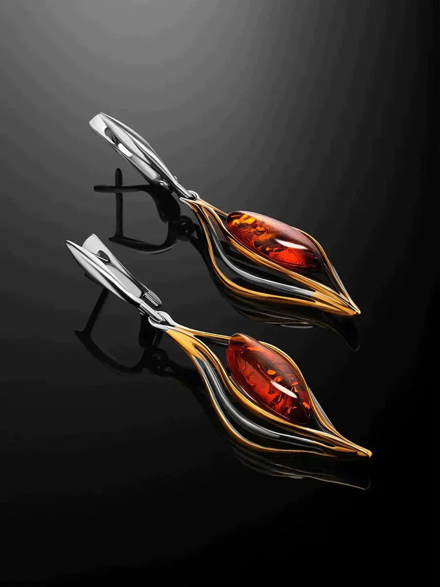 Silver earrings with a fiery pendant