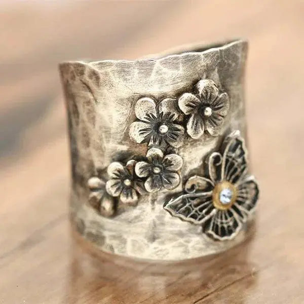 Butterfly-shaped ring with wide band