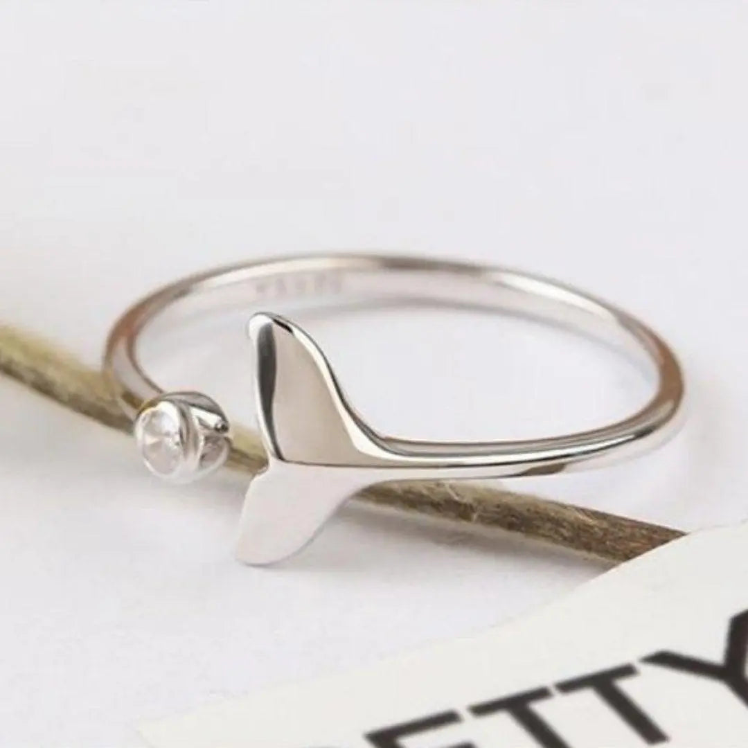 Ring with dolphin tail in sterling silver and adjustable zircons