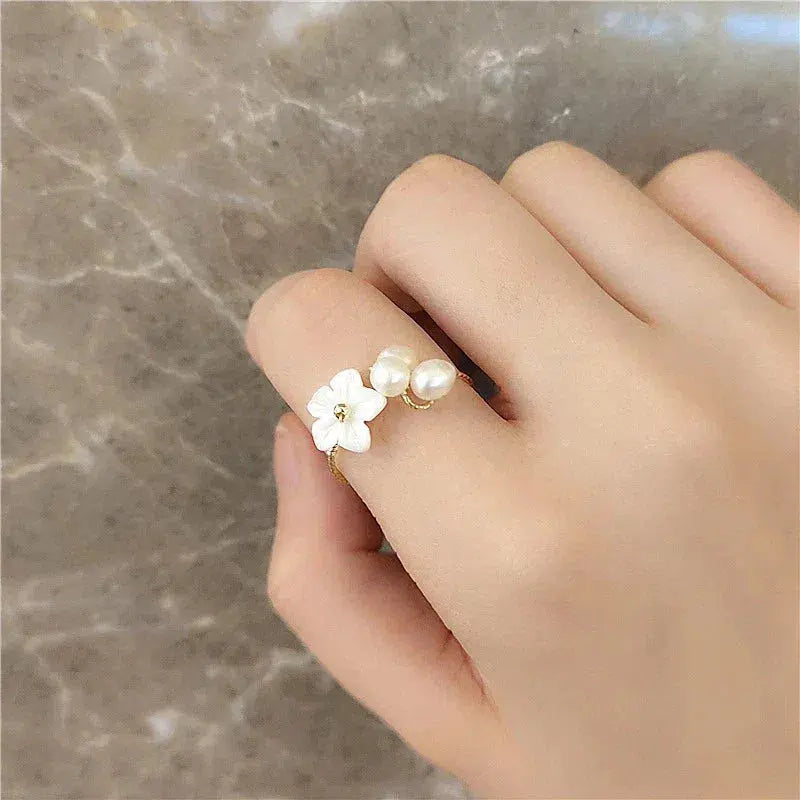Adjustable gold pearl flower ring