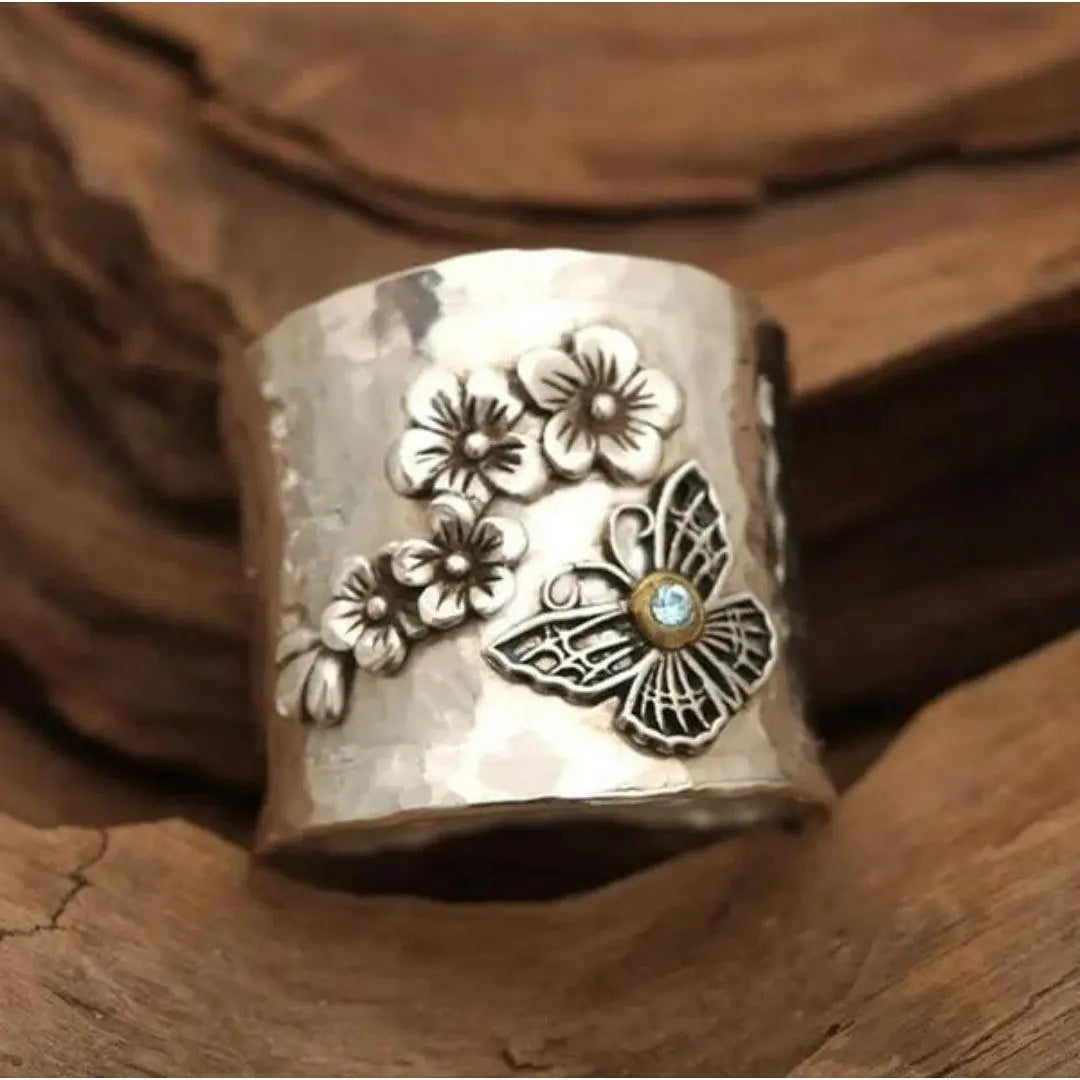Butterfly-shaped ring with wide band