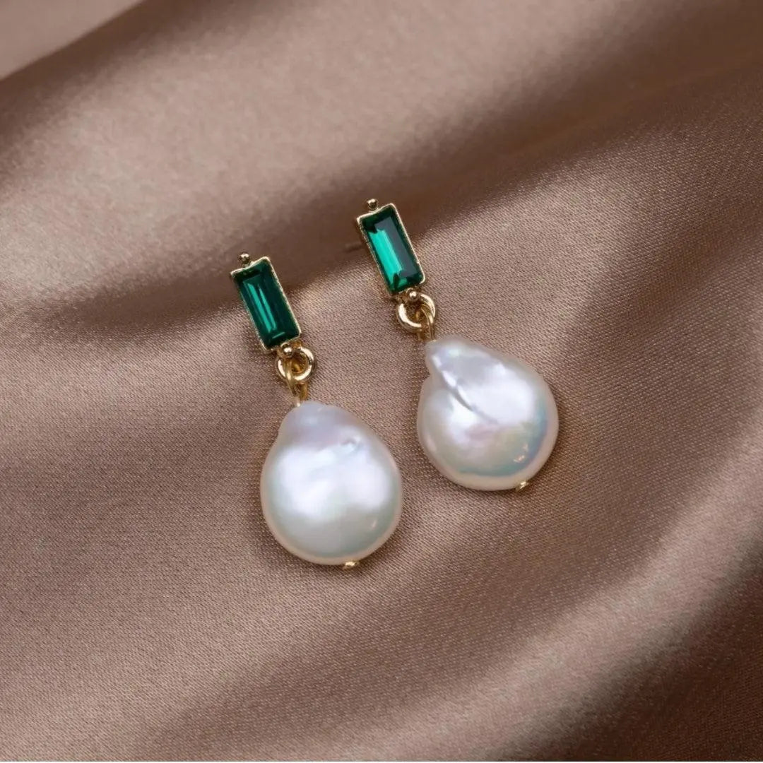 Luxury gold earrings with pearls and green zircons