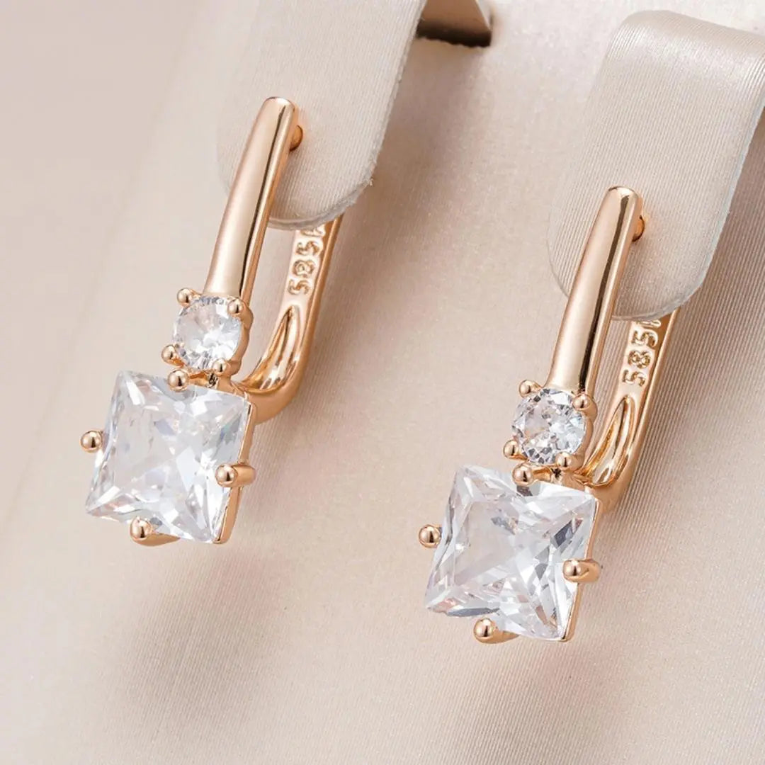 Gold earrings with zircons