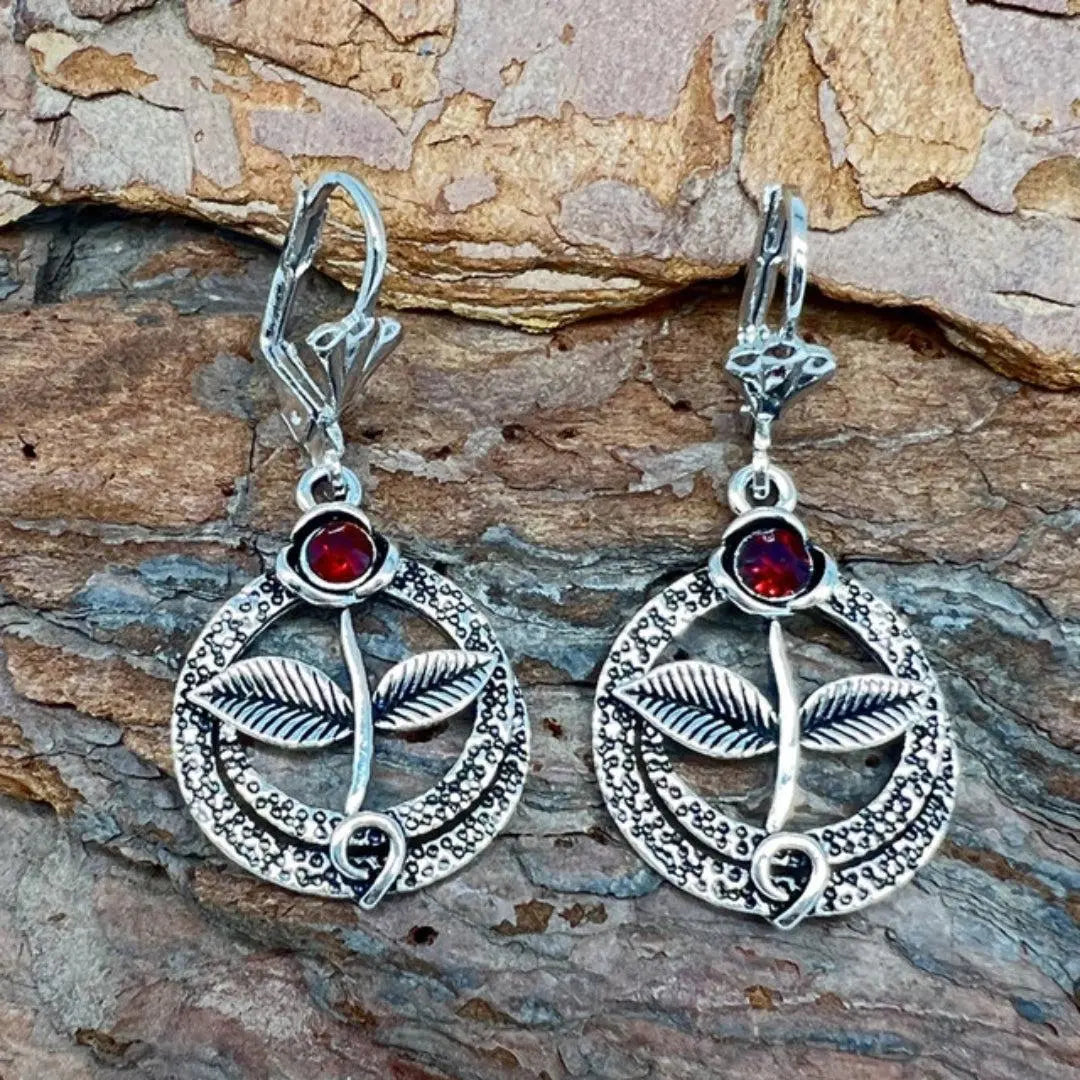 Vintage earrings with natural crystal in silver color