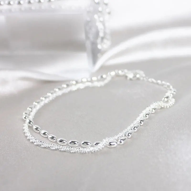 Silver bracelet with zircons