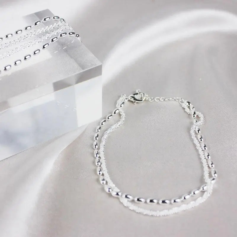 Silver bracelet with zircons