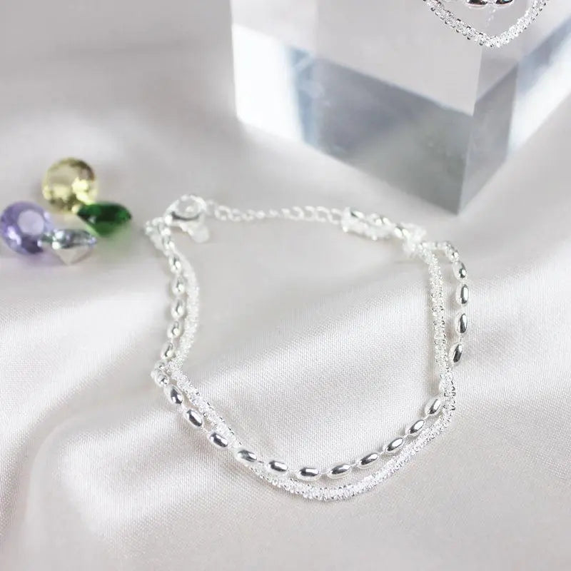 Silver bracelet with zircons