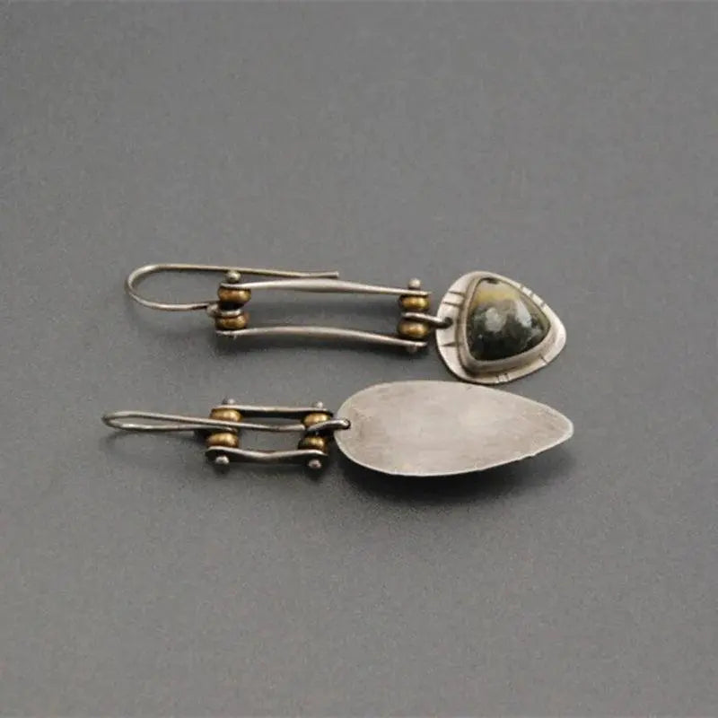 Long mechanical earrings in punk style