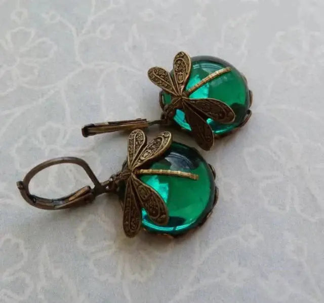 Spherical dragonfly earrings in antique gold color