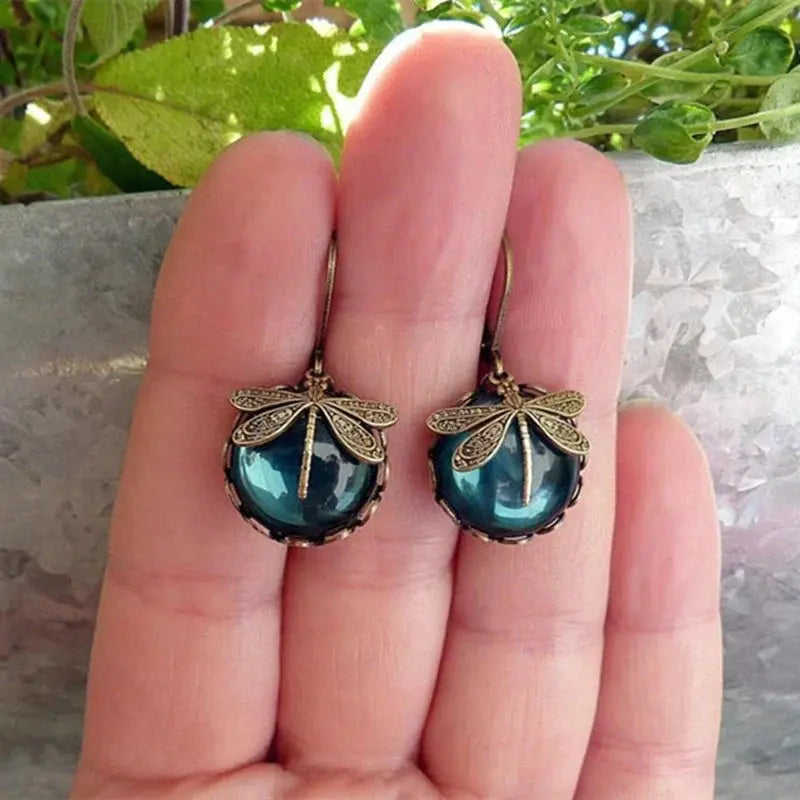 Spherical dragonfly earrings in antique gold color