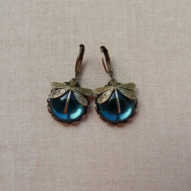 Spherical dragonfly earrings in antique gold color