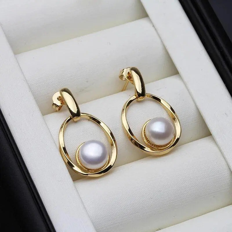 Elegant gold and pearl earrings