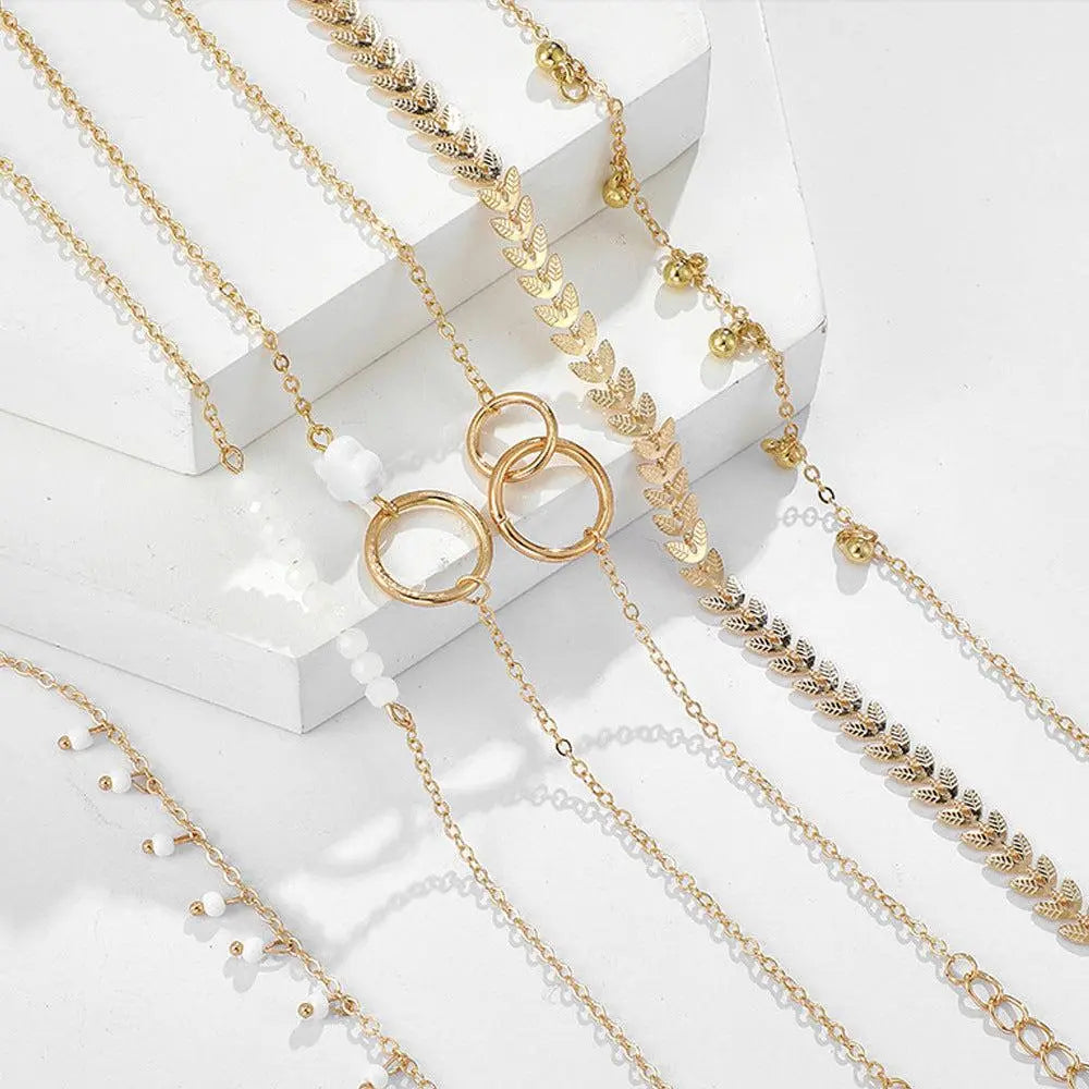Set of boho bracelets in gold color