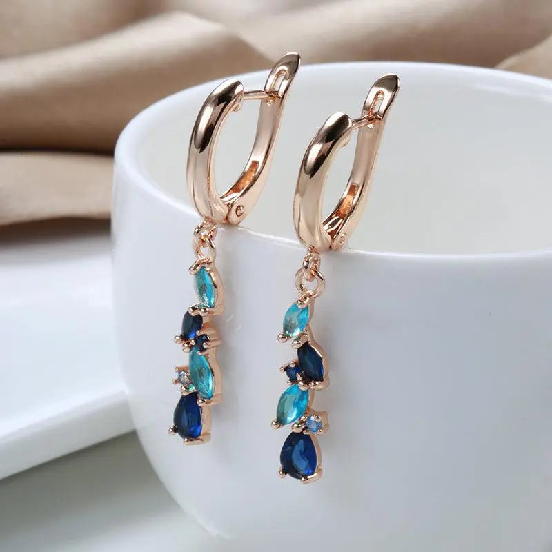 Elegant earrings with blue and gold crystals