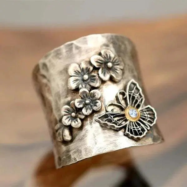 Butterfly-shaped ring with wide band