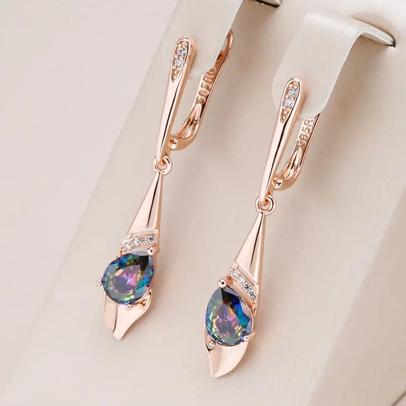 Multicolored crystal pendant earrings in gold color
