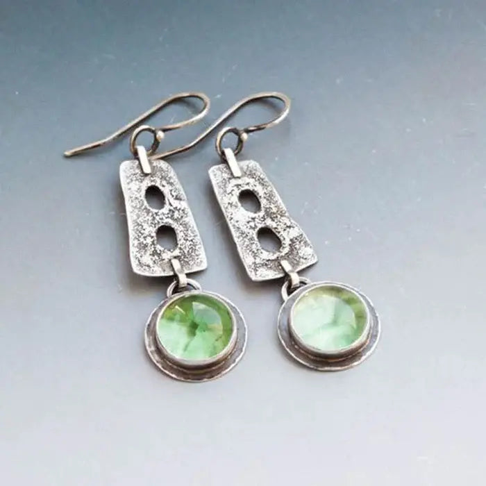 Boho earrings made of green crystal in silver color