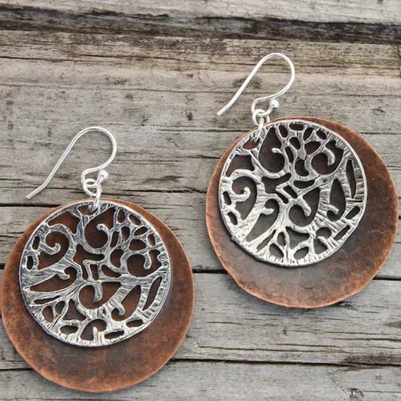 Sterling silver earrings with rounded bronze hole in vintage style