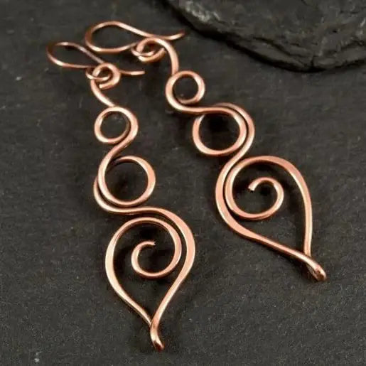 Hanging bronze earrings in vintage style