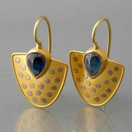 Gold shield with earrings with blue crystals