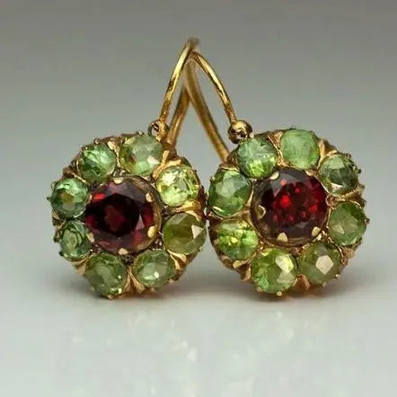 Round earrings with green and red crystals