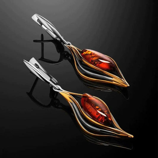 Silver earrings with a fiery pendant
