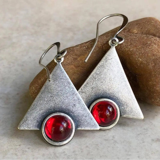 Triangular boho earrings with red stones in silver setting