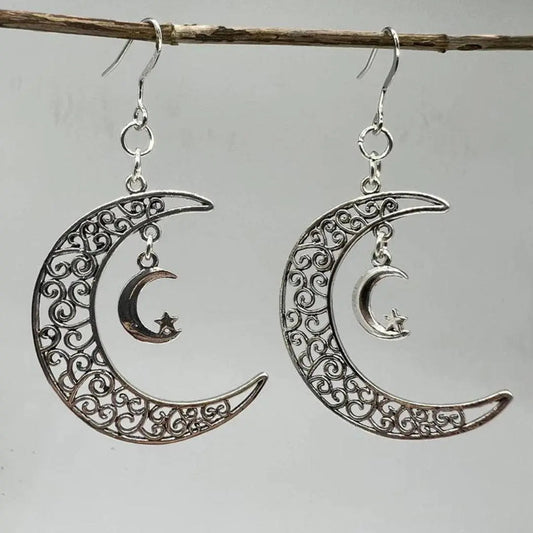 Silver earrings in the shape of the moon