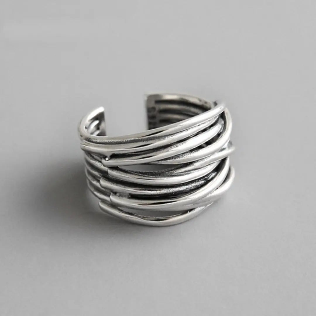 Adjustable, multi-layered ring in sterling silver