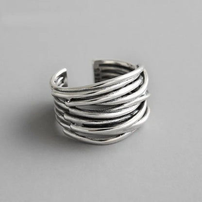 Adjustable, multi-layered ring in sterling silver