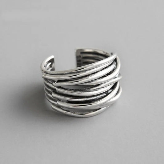 Adjustable, multi-layered ring in sterling silver