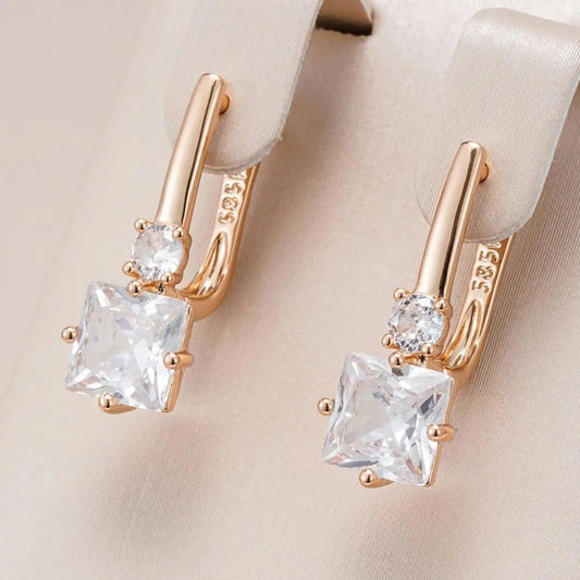 Gold earrings with zircons