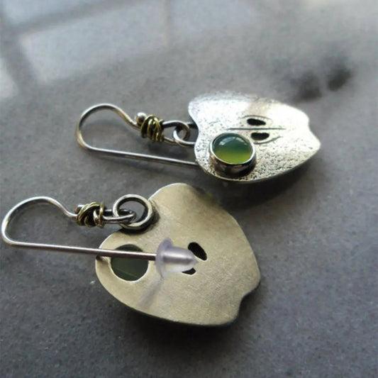 Earrings with green crystal in silver color