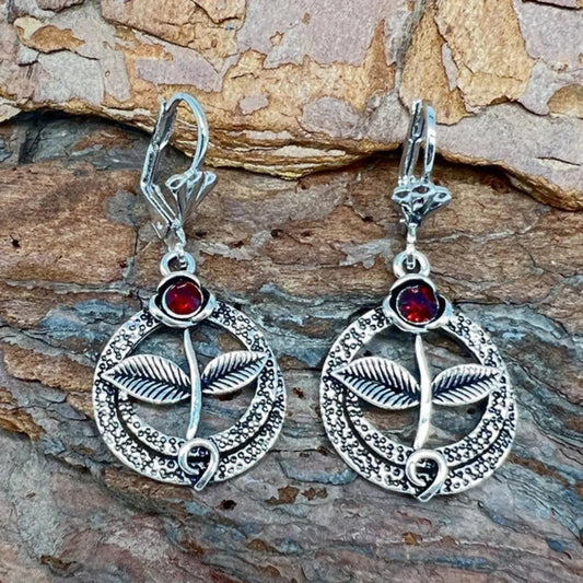 Vintage earrings with natural crystal in silver color