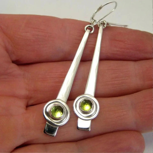 Silver earrings with yellow crystals