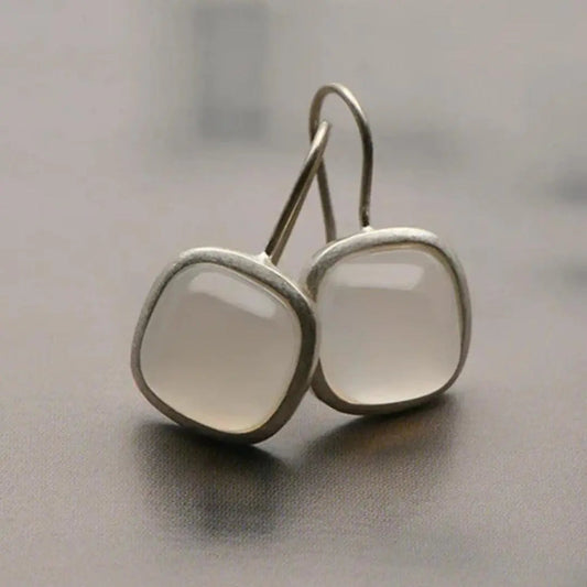Earrings with cubic moon crystal in vintage style