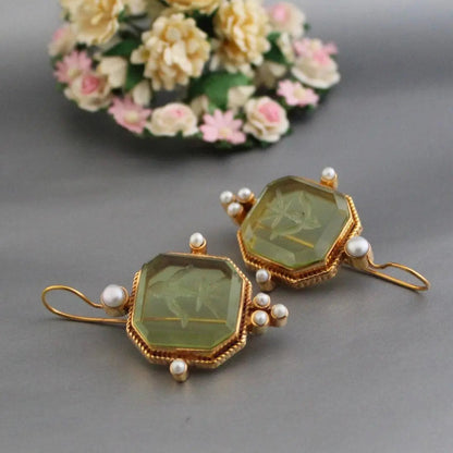 Green earrings with pearls in vintage style