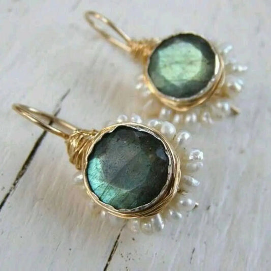 Gold vintage earrings with green stone