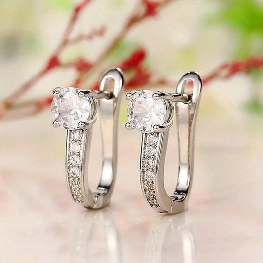 Elegant silver-plated earrings with zircons
