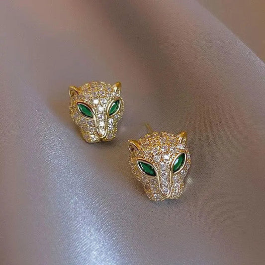 Shiny gold panther earrings