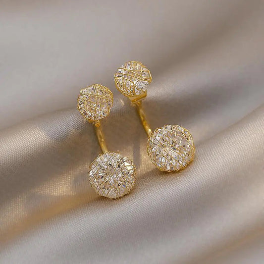 Shiny gold earrings with double beads