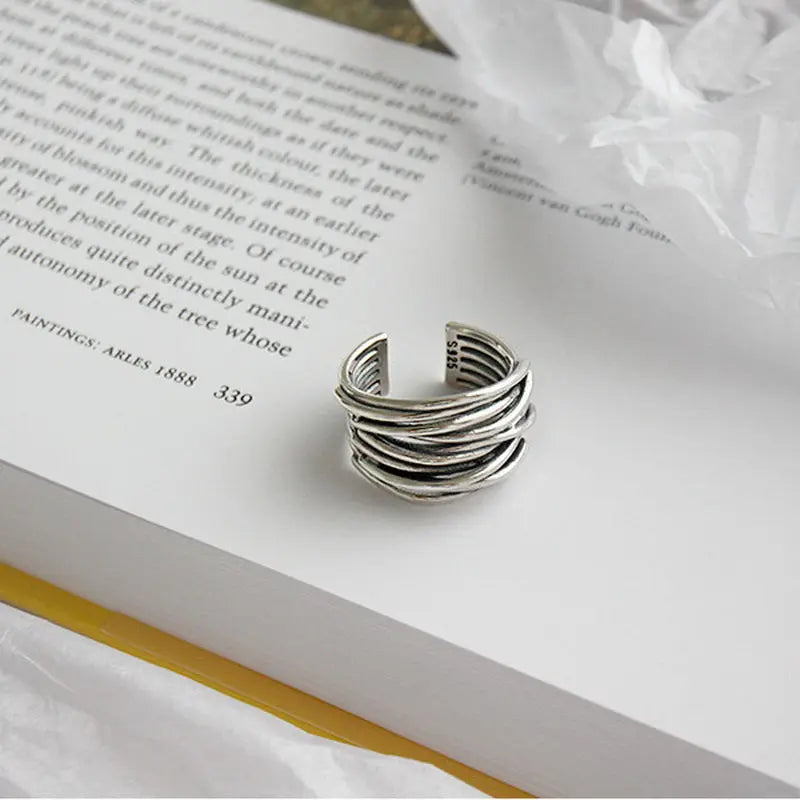 Adjustable, multi-layered ring in sterling silver