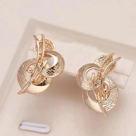 Gold earrings of irregular shape