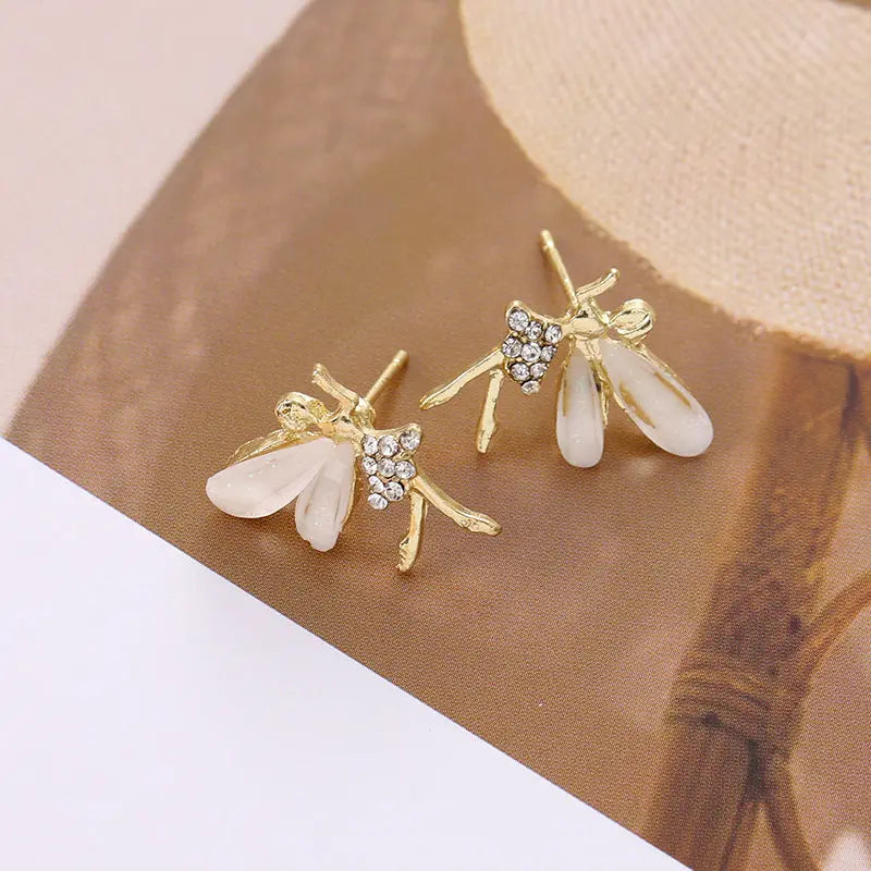 Gold elf earrings with pearls