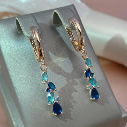 Elegant earrings with blue and gold crystals