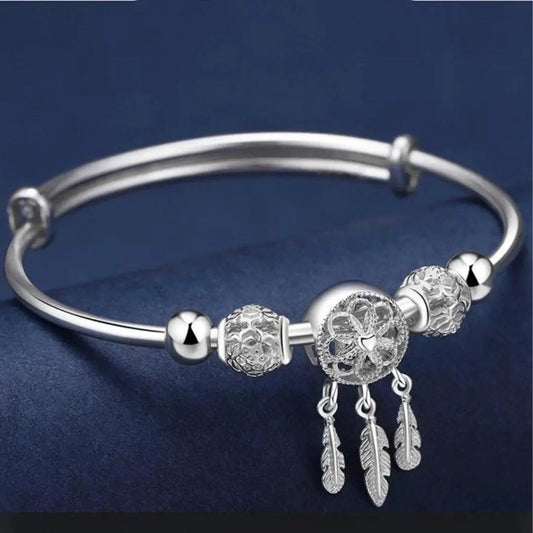 Adjustable bracelet with triple leaf pendants in sterling silver