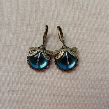 Spherical dragonfly earrings in antique gold color
