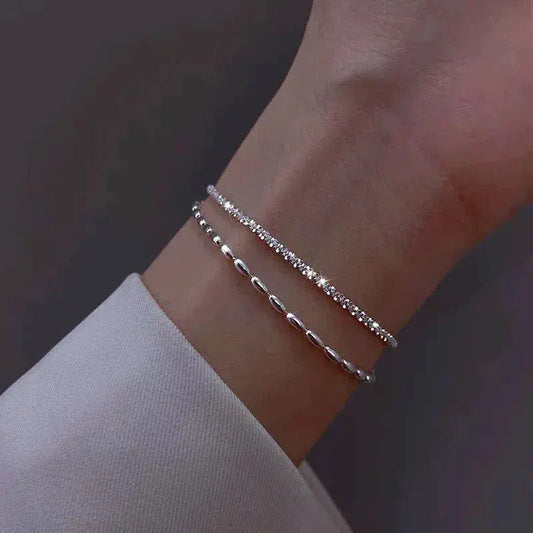 Silver bracelet with zircons