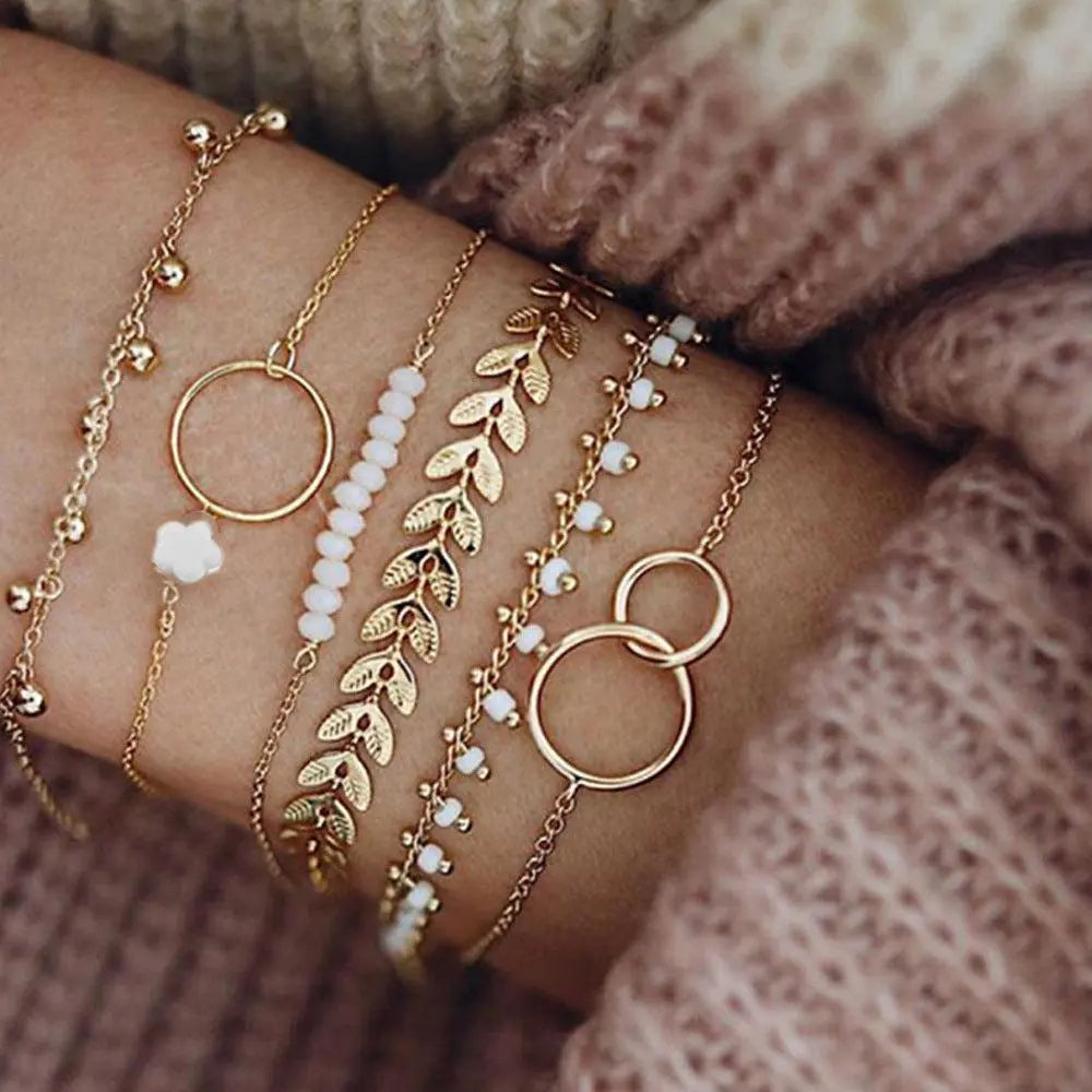 Set of boho bracelets in gold color