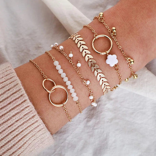 Set of boho bracelets in gold color